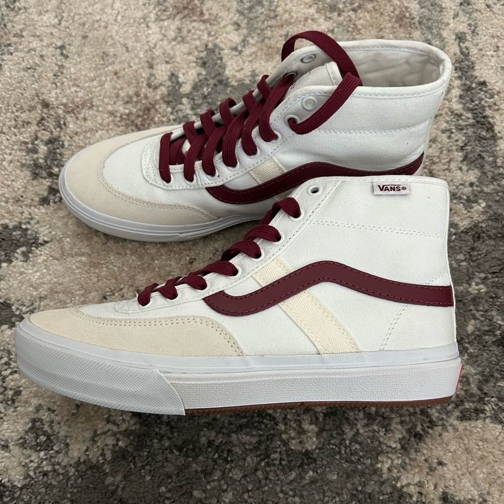 Limited edition men’s Gilbert Crockett high top Vans in white with burgundy.